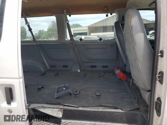 2004 Ford Econoline Passenger XL with VIN 1FBSS31L04HB37562, listed as a Copart auction lot 60328625 with 130,252 mi miles and Salvage title. Bid and sale history available at DreamBid. Image 10.