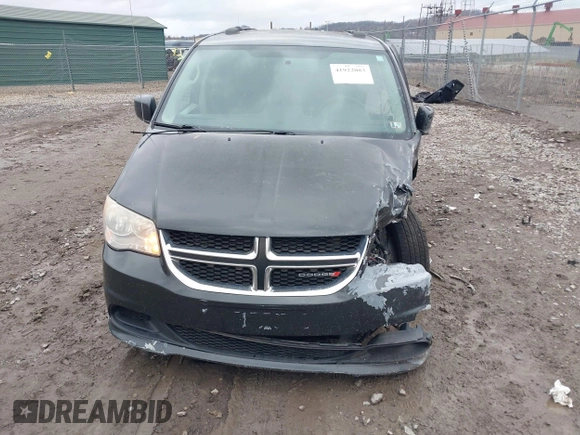 2012 Dodge Grand Caravan SXT with VIN 2C4RDGCG8CR242235, listed as a IAAI auction lot 41922083 with 124,306 mi miles and . Bid and sale history available at DreamBid. Image 12.