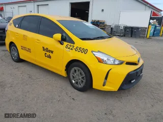 2015 Toyota Prius v Two with VIN JTDZN3EU9FJ037895, listed as a IAAI auction lot 41677455 with 164,615 mi miles. Bid and sale history available at carsss.com. Image 1.