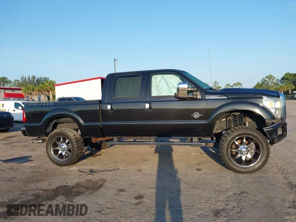 2015 Ford F-250 Lariat z VIN 1FT7W2BT0FEC39981, wystawiony jako IAAI lot #42201173 z przebiegiem 68 199 mil mil oraz . Historia ofert i sprzedaży dostępna na DreamBid. Obrazek 13.