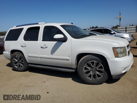 2007 Chevrolet Tahoe LTZ with VIN 1GNFC13J47R182259, listed as a Copart auction lot 57441205 with 204,898 mi miles and Salvage title. Bid and sale history available at DreamBid. Image 4.