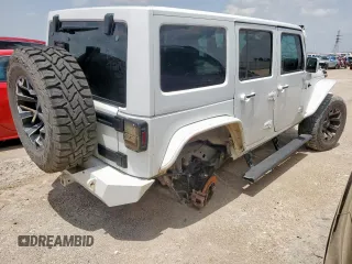 2015 Jeep Wrangler Unlimited Sport with VIN 1C4BJWDG9FL759012, listed as a Copart auction lot 61002465 with 101,395 mi miles and Salvage title. Bid and sale history available at DreamBid. Image 3.