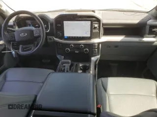 2023 Ford F-150 Lightning Pro with VIN 1FTVW1EL7PWG11261, listed as a Copart auction lot 64088925 with 3,288 mi miles and Salvage title. Bid and sale history available at DreamBid. Image 8.