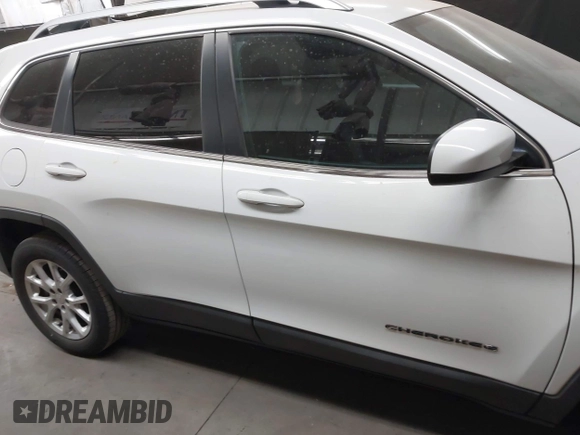 2016 Jeep Cherokee Altitude with VIN 1C4PJLCB7GW342904, listed as a IAAI auction lot 42281323 with 124,309 mi miles and . Bid and sale history available at DreamBid. Image 13.