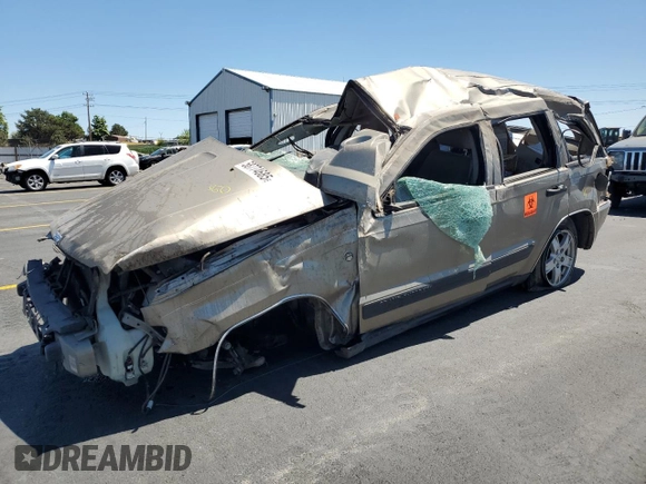 2005 Jeep Grand Cherokee Laredo z VIN 1J4HR48N65C517657, wystawiony jako Copart lot #58774685 z przebiegiem Nie podano mil oraz Szkoda całkowita • Salvage title. Historia ofert i sprzedaży dostępna na DreamBid. Obrazek 1.