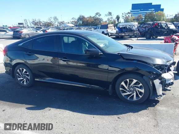 2016 Honda Civic EX with VIN 19XFC2F71GE023712, listed as a IAAI auction lot 41824595 with 87,127 mi miles and . Bid and sale history available at DreamBid. Image 14.