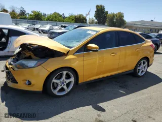 2012 Ford Focus Titanium with VIN 1FAHP3J27CL228036, listed as a Copart auction lot 69719014 with 118,266 mi miles and Salvage Title. Bid and sale history available at carsss.com. Image 1.