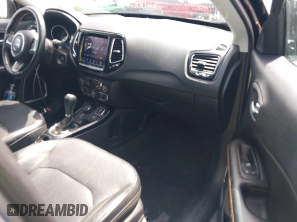 2018 Jeep Compass Limited with VIN 3C4NJDCB6JT131963, listed as a IAAI auction lot 42453633 with 96,782 mi miles and . Bid and sale history available at DreamBid. Image 5.
