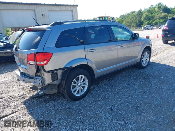 2017 Dodge Journey SXT z VIN 3C4PDCBG4HT563310, wystawiony jako IAAI lot #42190636 z przebiegiem 171 054 mil mil oraz . Historia ofert i sprzedaży dostępna na DreamBid. Obrazek 4.