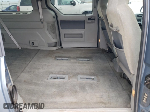 2005 Ford Freestar SE с VIN 2FMZA51615BA67146, выставлен на аукционе Copart как лот 71000634 с пробегом 84 096 миль миль и Списание • Salvage title. История ставок и продаж доступна на DreamBid. Изображение 11.