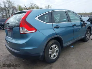 2014 Honda CR-V LX with VIN 2HKRM3H32EH517323, listed as a IAAI auction lot 42020715 with 121,389 mi miles. Bid and sale history available at carsss.com. Image 4.