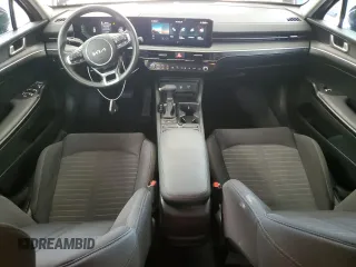 2025 Kia K5 LXS z VIN KNAG24J72S5301593, wystawiony jako Copart lot #58934805 z przebiegiem 19 649 mil mil oraz Czysty tytuł • Clean title. Historia ofert i sprzedaży dostępna na DreamBid. Obrazek 8.