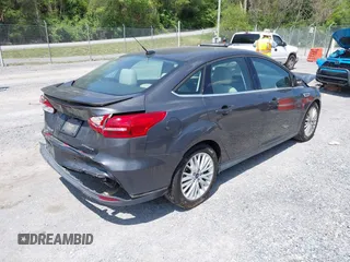 2018 Ford Focus Titanium с VIN 1FADP3J22JL314642, выставлен на аукционе IAAI как лот 42128194 с пробегом 62 787 миль миль и . История ставок и продаж доступна на DreamBid. Изображение 4.