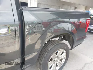 2015 Ford F-150 XLT with VIN 1FTEW1EG3FFB19022, listed as a IAAI auction lot 42452866 with 210,889 mi miles and . Bid and sale history available at DreamBid. Image 6.