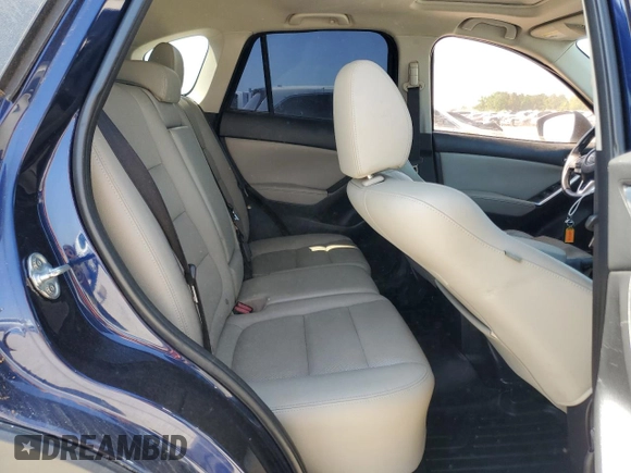 2013 Mazda CX-5 Grand Touring with VIN JM3KE2DE4D0147902, listed as a Copart auction lot 52696685 with 331,168 mi miles and Clean Title. Bid and sale history available at carsss.com. Image 11.