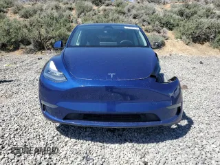 2023 Tesla Model Y Long Range with VIN 7SAYGDEE3PA106609, listed as a Copart auction lot 53839315 with 24,077 mi miles and Salvage Title. Bid and sale history available at DreamBid. Image 5.
