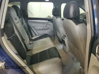 2006 Porsche Cayenne S z VIN WP1AB29P26LA70678, wystawiony jako Copart lot #57357145 z przebiegiem 207 978 mil mil oraz Tytuł czysty. Historia ofert i sprzedaży dostępna na DreamBid. Obrazek 11.