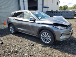 2022 Infiniti QX50 Essential with VIN 3PCAJ5CB5NF120297, listed as a Copart auction lot 65633113 with 10,035 mi miles and . Bid and sale history available at DreamBid. Image 4.