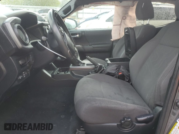 2019 Toyota Tacoma SR with VIN 3TMCZ5AN7KM237563, listed as a Copart auction lot 53919355 with 65,392 mi miles and Salvage title. Bid and sale history available at DreamBid. Image 7.