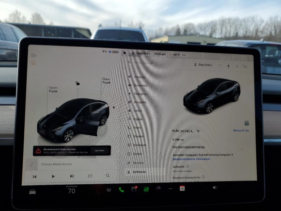 2024 Tesla Model Y with VIN 7SAYGDED1RF016792, listed as a Copart auction lot 50057345 with 6,749 mi miles and Salvage Title. Bid and sale history available at carsss.com. Image 9.