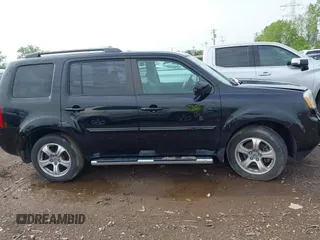 2014 Honda Pilot EX-L with VIN 5FNYF4H5XEB011816, listed as a IAAI auction lot 42165791 with 118,366 mi miles and . Bid and sale history available at carsss.com. Image 13.