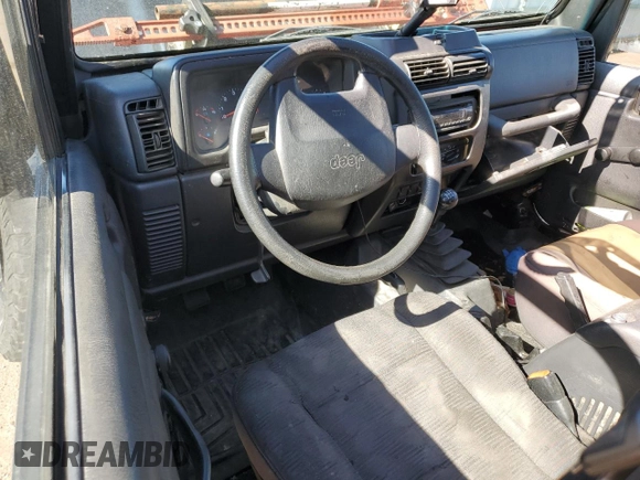 2004 Jeep Wrangler Sport with VIN 1J4FA49S04P751464, listed as a Copart auction lot 61686865 with Not provided miles and Salvage title. Bid and sale history available at DreamBid. Image 8.