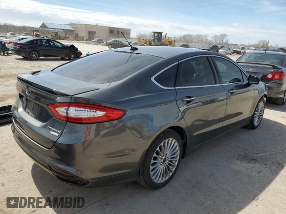 2016 Ford Fusion Titanium with VIN 3FA6P0D9XGR406186, listed as a Copart auction lot 50601175 with 207,220 mi miles and Salvage title. Bid and sale history available at DreamBid. Image 3.