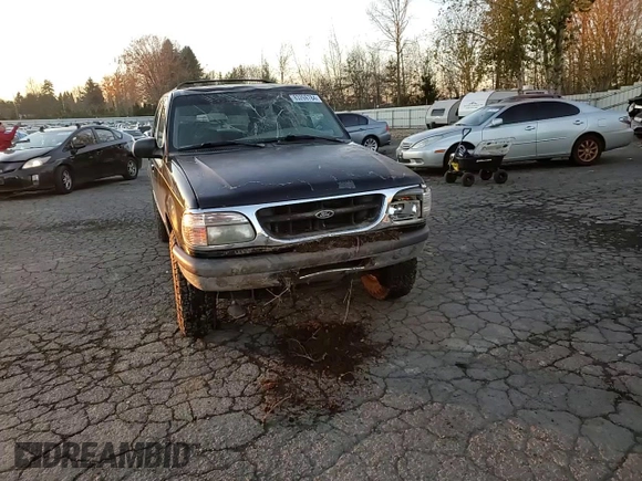 1997 Ford Explorer XL with VIN 1FMDU34E8VUC95969, listed as a Copart auction lot 83269784 with 174,035 mi miles and Salvage title. Bid and sale history available at DreamBid. Image 11.