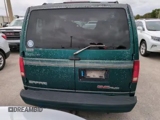 1997 GMC Safari z VIN 1GDDM19W5VB544214, wystawiony jako Copart lot #74226704 z przebiegiem Nie podano mil oraz Szkody całkowita. Historia ofert i sprzedaży dostępna na DreamBid. Obrazek 6.
