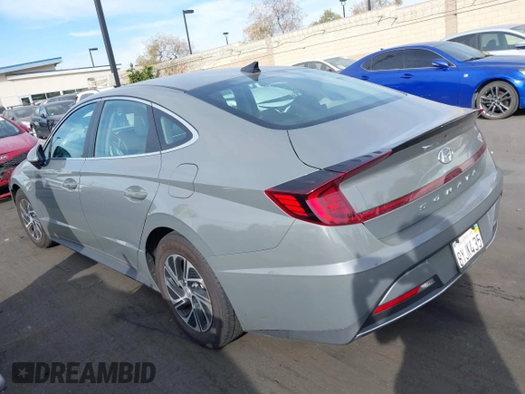 2022 Hyundai Sonata Hybrid Blue with VIN KMHL24JJ5NA037502, listed as a IAAI auction lot 40975379 with 69,018 mi miles. Bid and sale history available at carsss.com. Image 15.