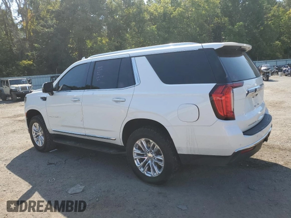 2021 GMC Yukon SLT with VIN 1GKS1BKT0MR425247, listed as a Copart auction lot 69205584 with 72,952 mi miles and Salvage Title. Bid and sale history available at carsss.com. Image 2.