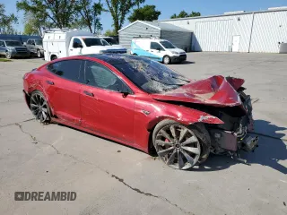 2016 Tesla Model S 90D with VIN 5YJSA1E44GF162393, listed as a Copart auction lot 51708825 with 173,880 mi miles and Salvage title. Bid and sale history available at DreamBid. Image 4.