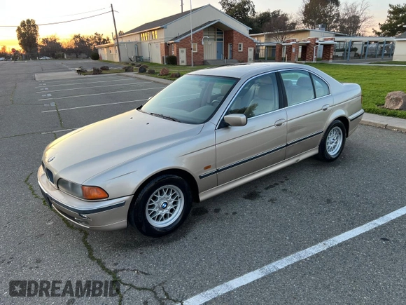1998 BMW 5 Series 528iA with VIN WBADD6320WBW46302, listed as a Copart auction lot 45062025 with 42,667 mi miles and Salvage Title. Bid and sale history available at carsss.com. Image 2.