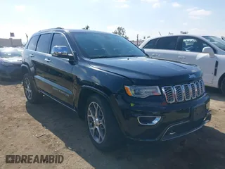 2019 Jeep Grand Cherokee Overland with VIN 1C4RJECG4KC556145, listed as a IAAI auction lot 41555207 with 59,630 mi miles. Bid and sale history available at carsss.com. Image 1.
