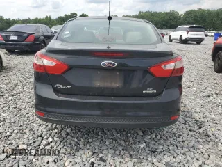 2012 Ford Focus SE with VIN 1FAHP3F28CL371926, listed as a Copart auction lot 60127115 with 162,617 mi miles and Salvage title. Bid and sale history available at DreamBid. Image 6.