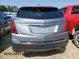 2023 Cadillac XT5 FWD Luxury z VIN 1GYKNAR4XPZ144533, wystawiony jako Copart lot #74734164 z przebiegiem Nie podano mil oraz Nie do naprawy • Non repairable. Historia ofert i sprzedaży dostępna na DreamBid. Obrazek 6.
