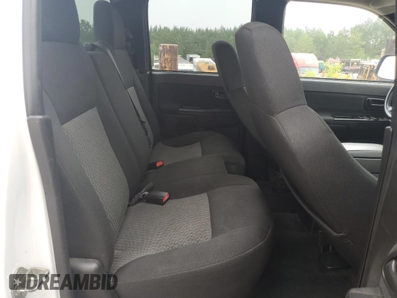 2007 GMC Canyon SLE1 z VIN 1GTDS13E678222966, wystawiony jako Copart lot #59161005 z przebiegiem 216 084 mil mil oraz Czysty tytuł • Clean title. Historia ofert i sprzedaży dostępna na DreamBid. Obrazek 10.