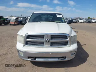 2009 Dodge 1500 SLT with VIN 1D3HV13T69S792700, listed as a IAAI auction lot 42180236 with 171,152 mi miles. Bid and sale history available at carsss.com. Image 6.