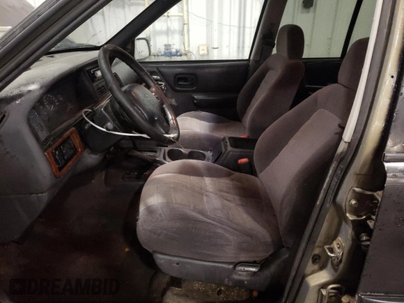 1997 Jeep Grand Cherokee Laredo с VIN 1J4GZ58S3VC508180, выставлен на аукционе Copart как лот 54856525 с пробегом 214 845 миль миль и На запчасти • Non repairable. История ставок и продаж доступна на DreamBid. Изображение 7.