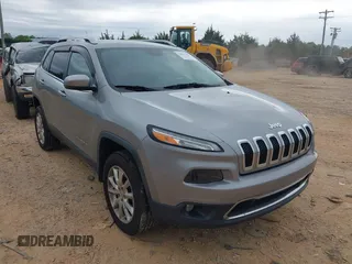 2015 Jeep Cherokee Limited with VIN 1C4PJMDS3FW706058, listed as a IAAI auction lot 41951302 with 163,404 mi miles. Bid and sale history available at carsss.com. Image 1.