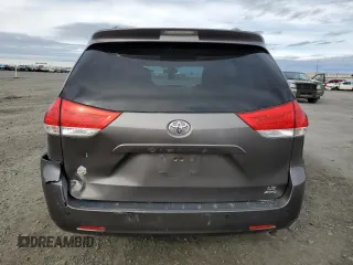 2014 Toyota Sienna LE with VIN 5TDJK3DC7ES073648, listed as a Copart auction lot 50554095 with 136,236 mi miles and Salvage Title. Bid and sale history available at DreamBid. Image 6.