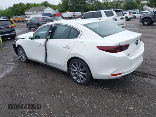 2021 Mazda 3 Preferred z VIN 3MZBPBCL0MM250862, wystawiony jako IAAI lot #42318612 z przebiegiem 86 056 mil mil oraz . Historia ofert i sprzedaży dostępna na DreamBid. Obrazek 3.