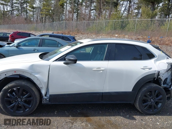 2022 Mazda CX-30 2.5 Turbo with VIN 3MVDMBAY7NM443187, listed as a IAAI auction lot 41771395 with 39,475 mi miles and . Bid and sale history available at DreamBid. Image 14.