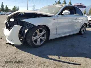 2012 BMW 1 Series 128i with VIN WBAUP9C5XCVL91963, listed as a Copart auction lot 72072414 with 126,608 mi miles and Salvage title. Bid and sale history available at DreamBid. Image 1.