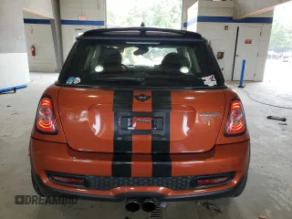 2013 MINI Hardtop S with VIN WMWSV3C52DT396176, listed as a Copart auction lot 59207165 with 104,194 mi miles and Salvage title. Bid and sale history available at DreamBid. Image 6.