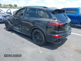 2016 Porsche Cayenne GTS z VIN WP1AD2A25GLA70430, wystawiony jako IAAI lot #42547008 z przebiegiem 108 374 mil mil oraz . Historia ofert i sprzedaży dostępna na DreamBid. Obrazek 3.
