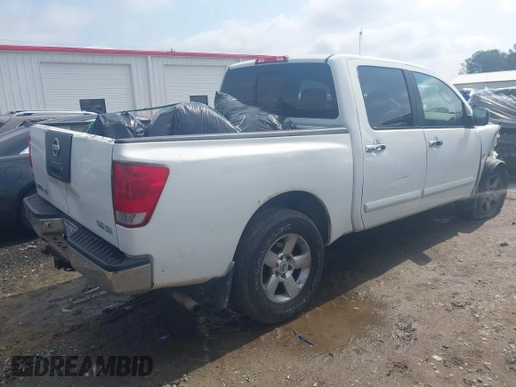2004 Nissan Titan LE with VIN 1N6AA07B74N581334, listed as a IAAI auction lot 42265633 with 189,892 mi miles and . Bid and sale history available at DreamBid. Image 4.