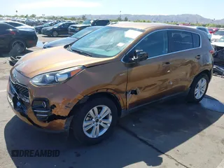 2017 Kia Sportage LX z VIN KNDPMCAC5H7121297, wystawiony jako IAAI lot #42088915 z przebiegiem 91 374 mil mil oraz . Historia ofert i sprzedaży dostępna na DreamBid. Obrazek 17.