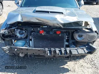 2014 Dodge Challenger R/T z VIN 2C3CDYBT9EH139932, wystawiony jako IAAI lot #42261252 z przebiegiem 95 241 mil mil oraz . Historia ofert i sprzedaży dostępna na DreamBid. Obrazek 6.