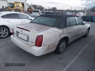 2004 Cadillac DeVille z VIN 1G6KD54Y14U172470, wystawiony jako IAAI lot #41803278 z przebiegiem 115 056 mil mil oraz . Historia ofert i sprzedaży dostępna na DreamBid. Obrazek 4.